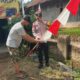 Sambut HUT Kemerdekaan RI ke-80, Bhabinkamtibmas Polsek Padang Cermin Bersama Bhabinsa Ajak Masyarakat Kibarkan Bendera Merah Putih